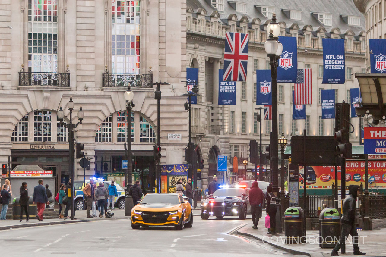 Filming of 'Transformers: The Last Knight' in London. Confused bystanders watch as a dramatic police car chase is filmed around Picadilly early this morning.  In these scene Bumblebee (the yellow car) is being chased by Barricade (the police car). Featuring: Atmosphere Where: London, United Kingdom When: 25 Sep 2016 Credit: WENN.com