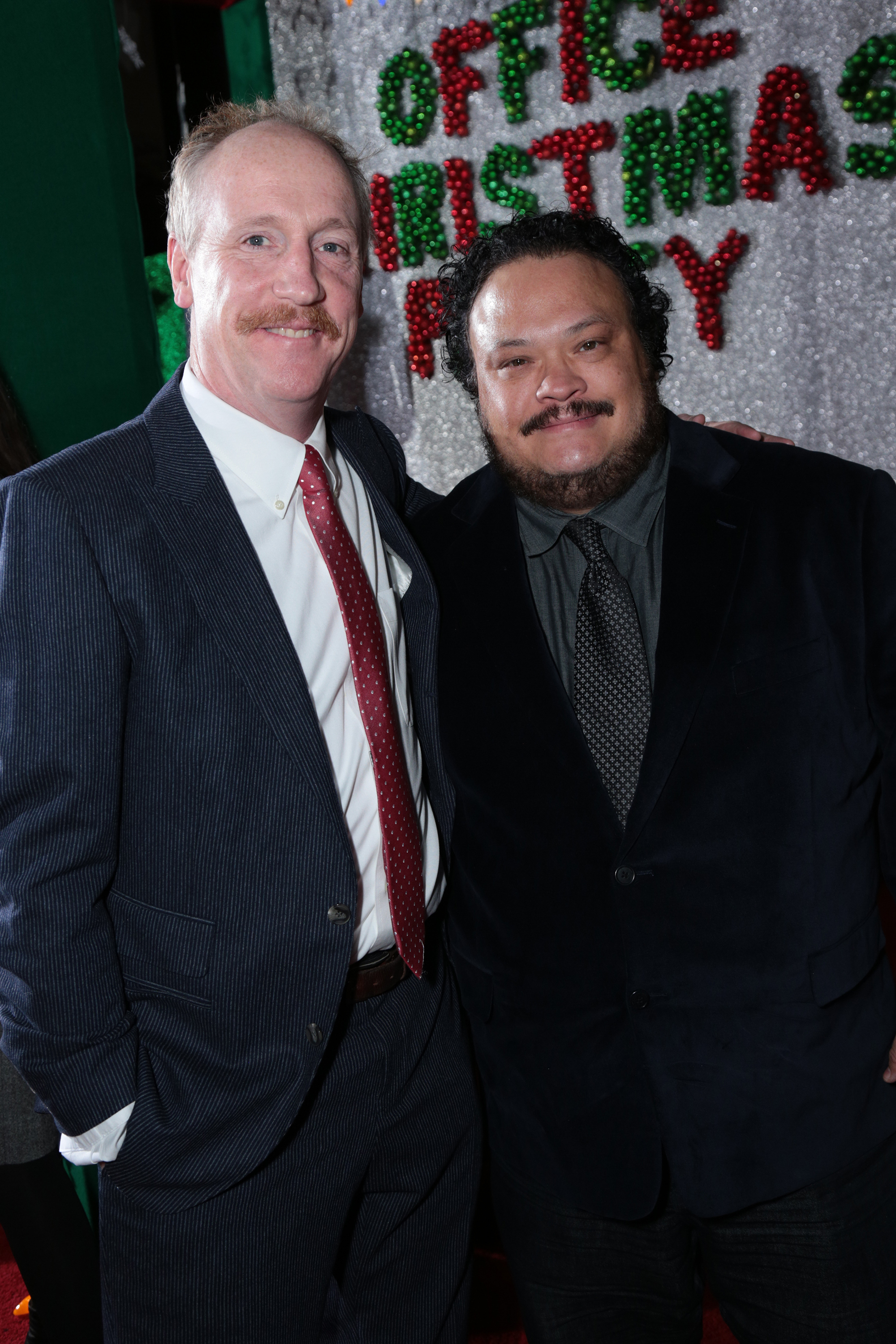 Matt Walsh and Adrian Martinez pose as Paramount Pictures presents the Los Angeles premiere of "Office Christmas Party" at the Regency Village Theater in Los Angeles, CA on Wednesday, December 7, 2016  (Photo: Alex J. Berliner / ABImages)