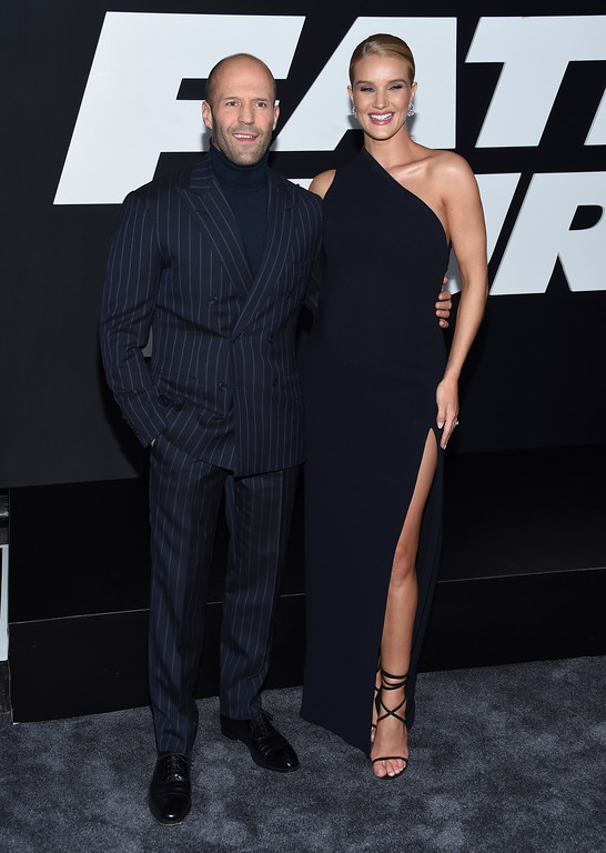 Jason Statham, left, and Rosie Huntington-Whiteley attend the world premiere of Universal Pictures' "The Fate of the Furious" at Radio City Music Hall on Saturday, April 8, 2017, in New York. (Photo by Evan Agostini/Invision/AP)