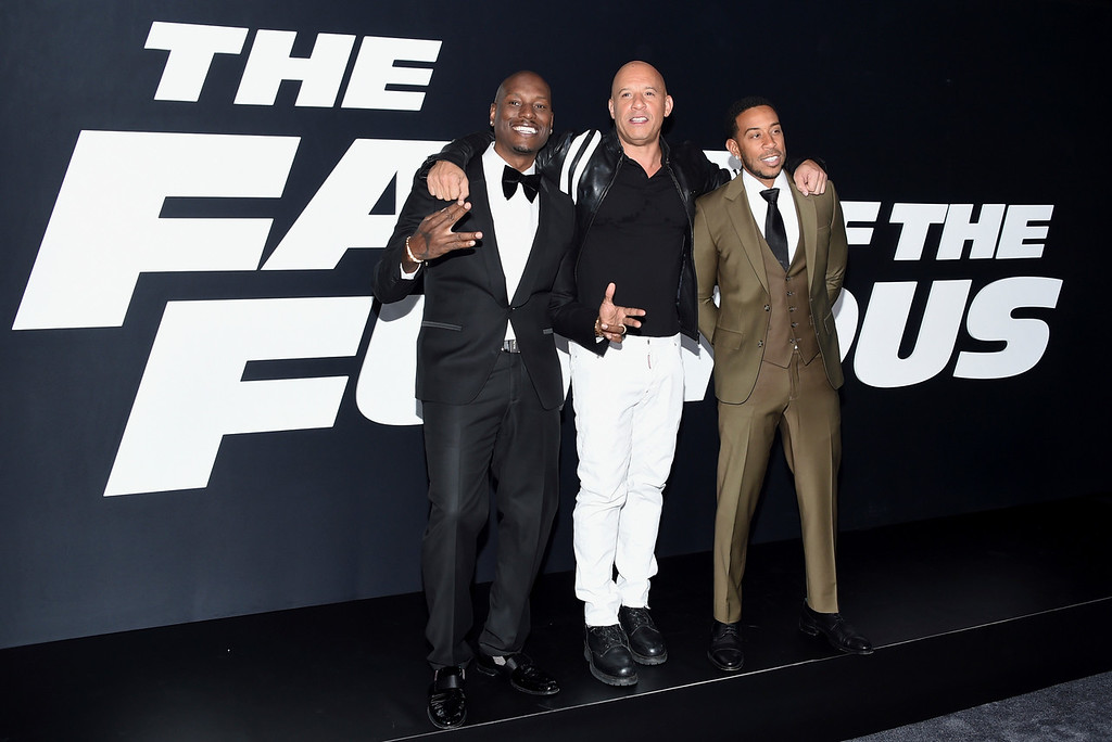 Tyrese Gibson, from left, Vin Diesel and Ludacris attend the world premiere of Universal Pictures' "The Fate of the Furious" at Radio City Music Hall on Saturday, April 8, 2017, in New York. (Photo by Evan Agostini/Invision/AP)
