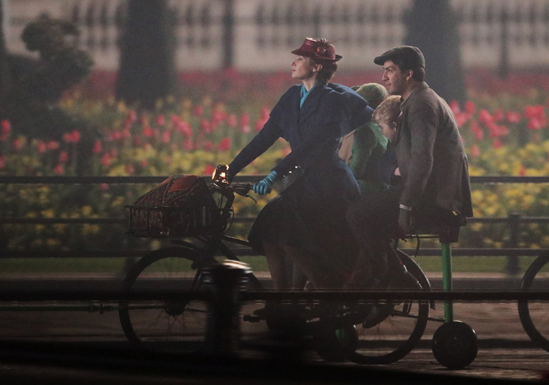 Emily Blunt and Lin-Manuel Miranda take part in filming of a scene from the movie sequel Mary Poppins Returns in front of Buckingham Palace, central London. (Photo by Yui Mok/PA Images via Getty Images)
