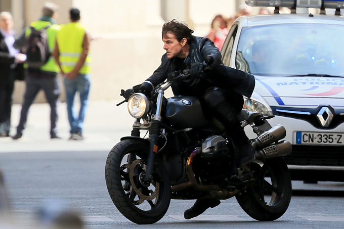 PARIS, FRANCE - APRIL 11:  Actor Tom Cruise is pictured filming on a Motorbike on set for 'Mission:Impossible 6 Gemini' filming  on April 11, 2017 in Paris, France.  (Photo by Pierre Suu/GC Images)